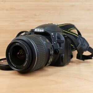 Nikon D3100 14.2MP DSLR Camera w/ AF-S Nikkor DX VR 18-55mm f/3.5-5.6G Lens